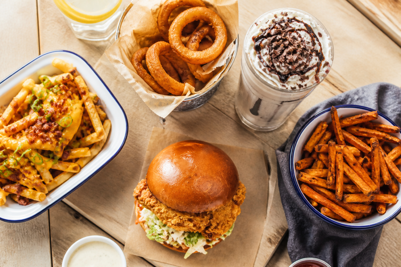 Beboz Burgers Club spread with burger, fries, shake and onion rings